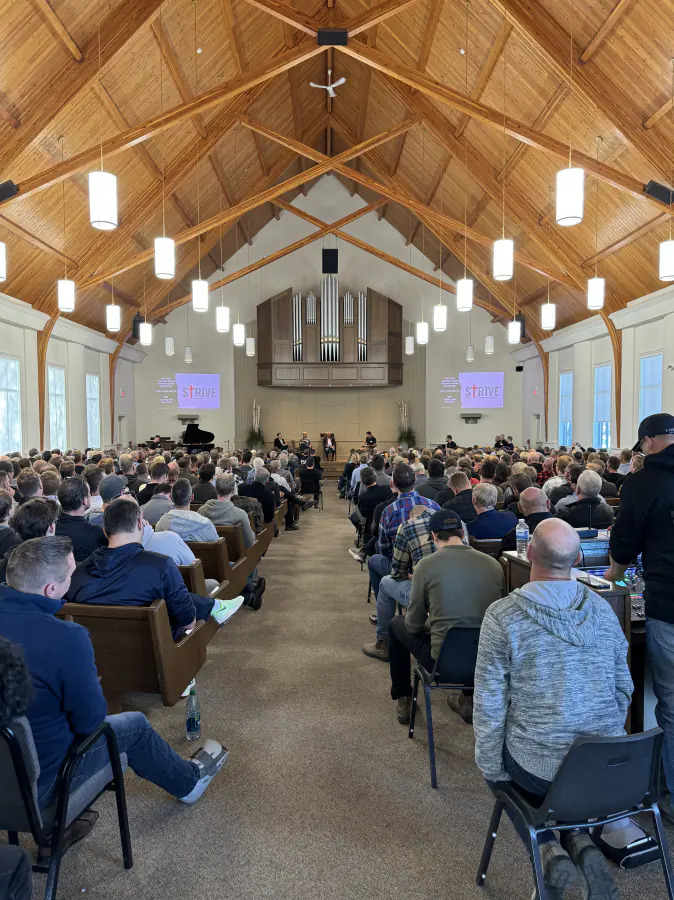 A full room of men gathered for the 2024 Strive Men's Conference