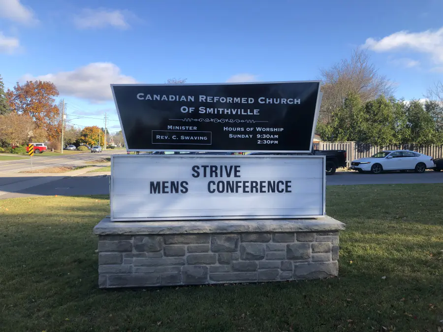 The 2024 Strive Men's Conference sign outside the Smithville church